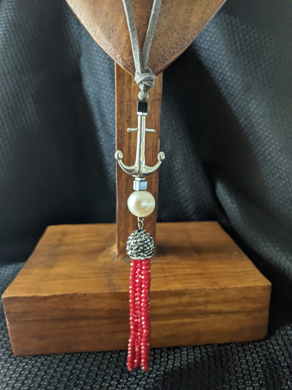 anchor, pearl, red crystal tassel pendant, grey suede
